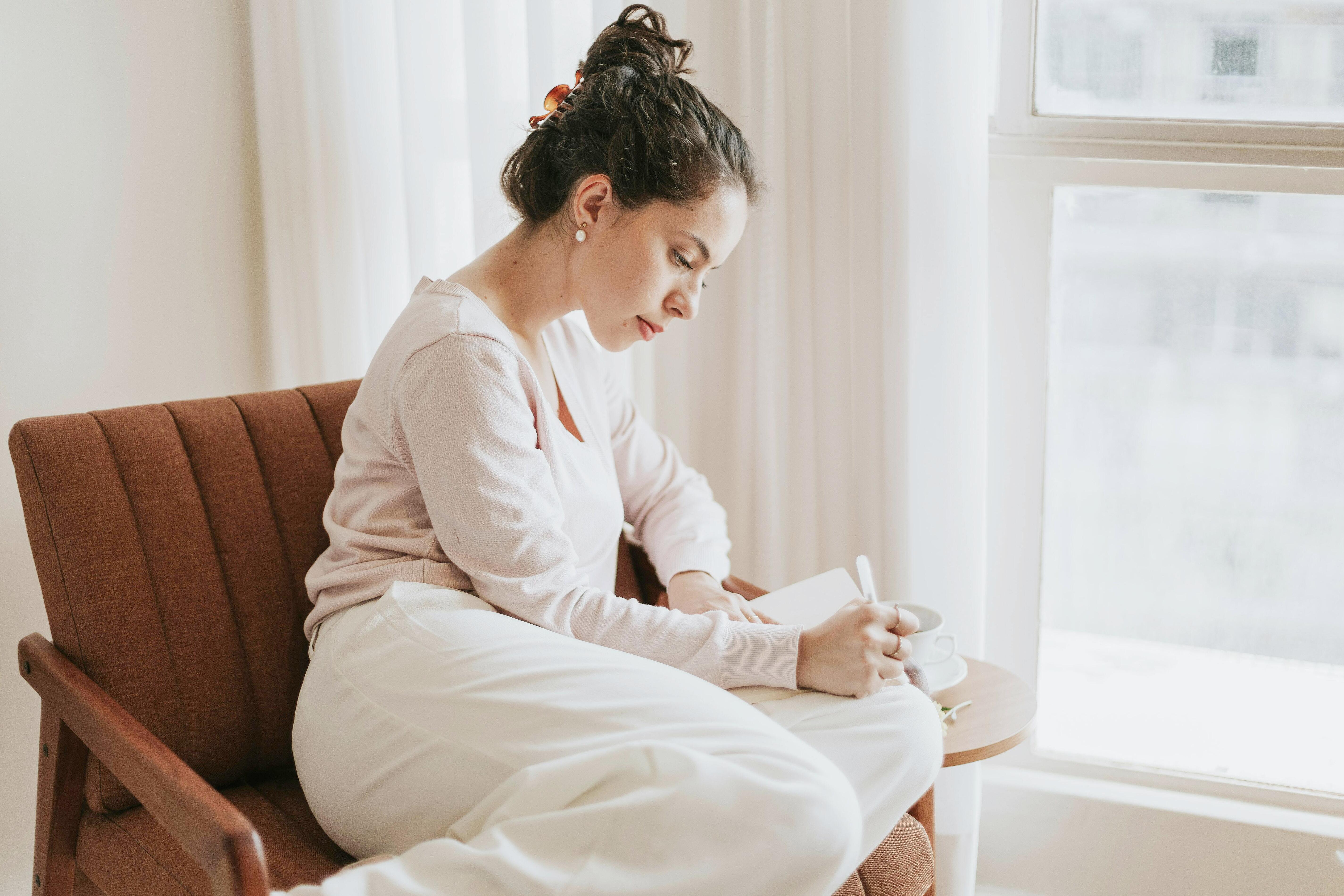 person reflecting on mental health feelings at home