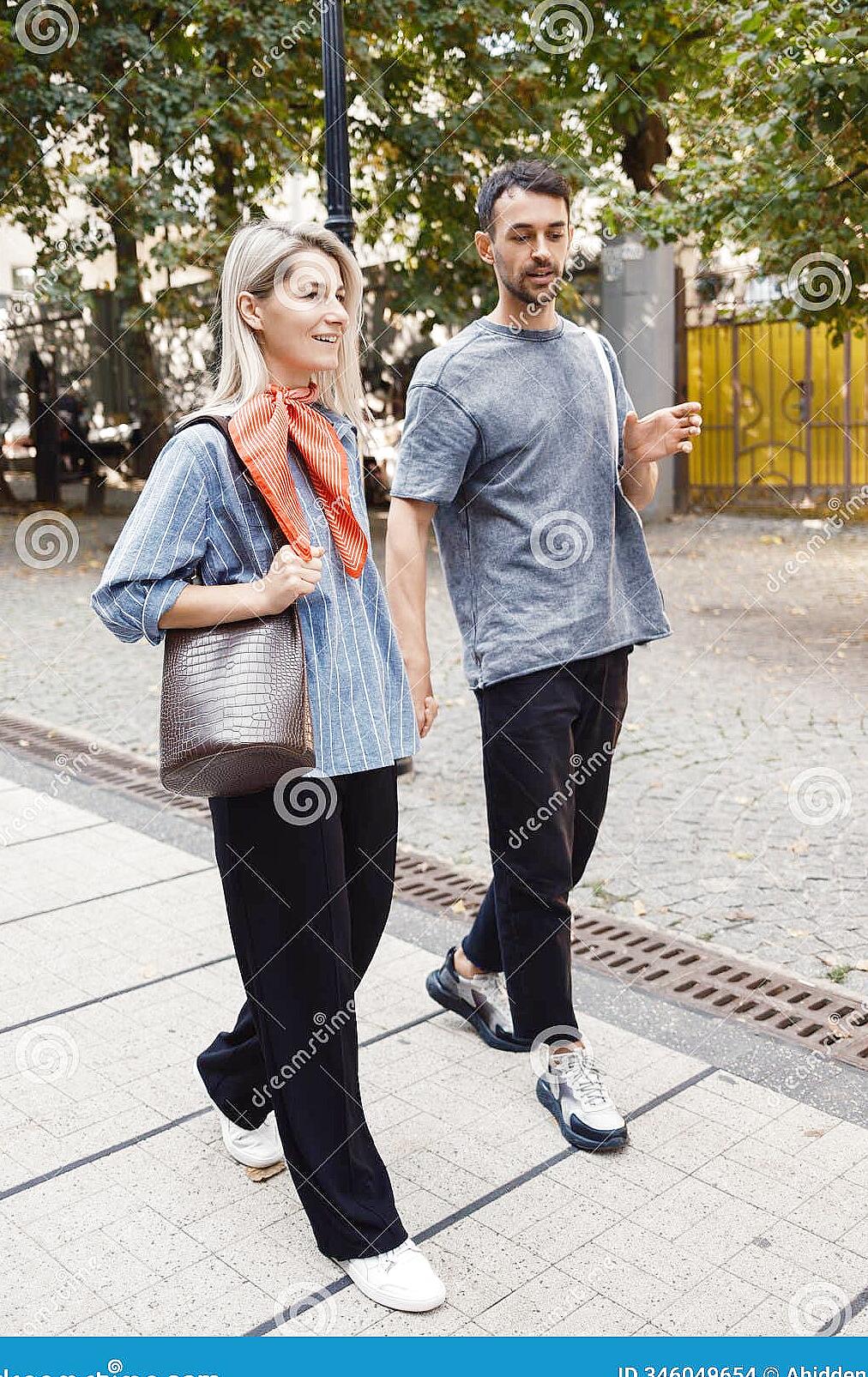 Couple discussing values during a peaceful city park walk