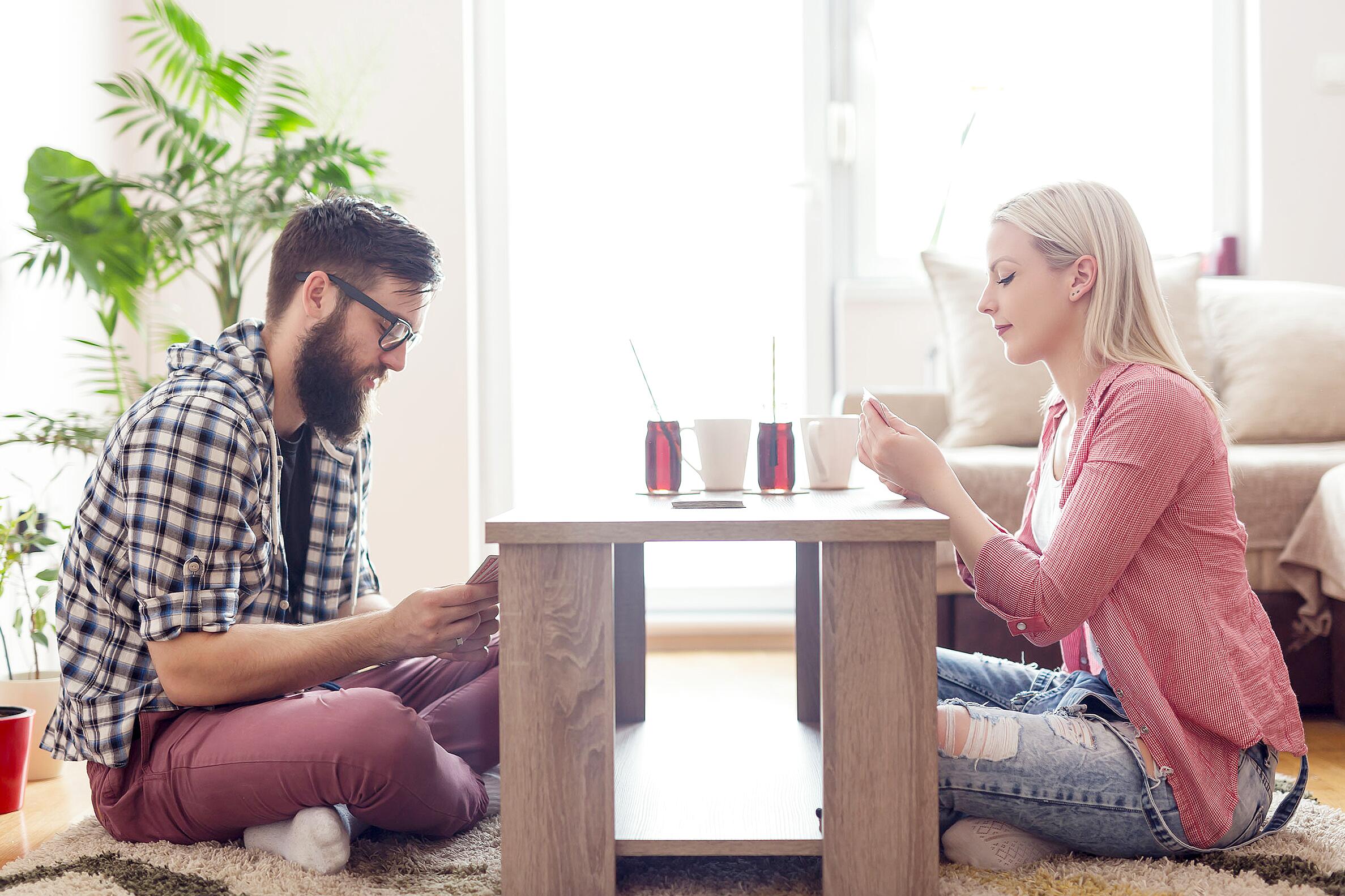 Couple engaging in Love Maps exercise to enhance relationship knowledge