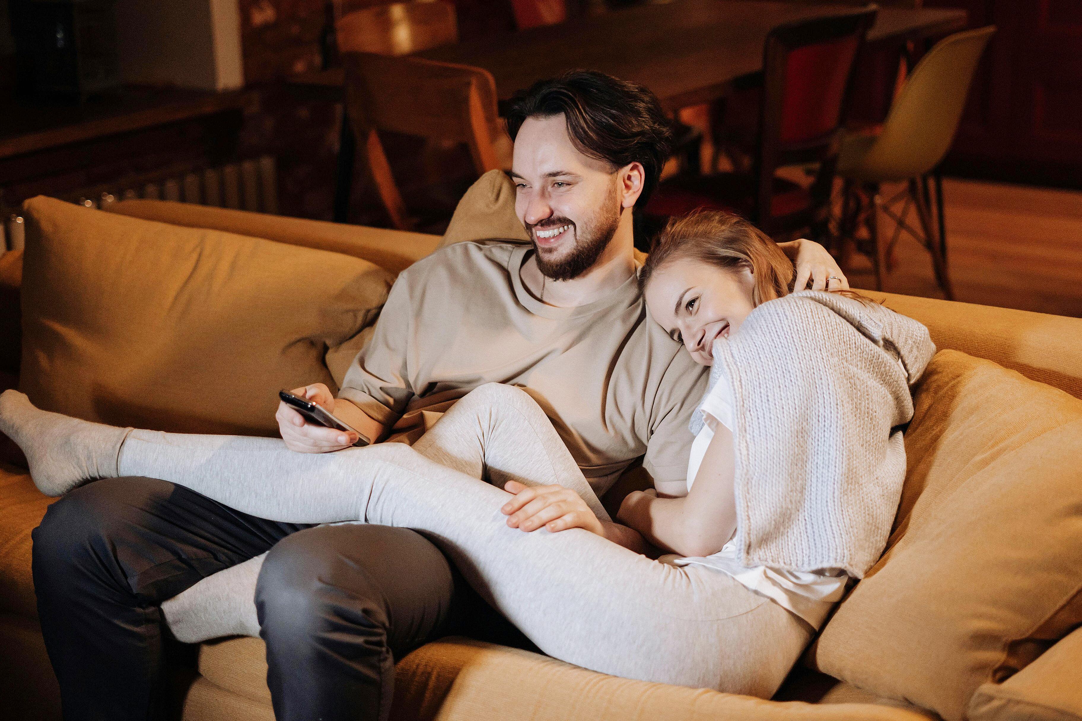 Couple having a relaxed meaningful conversation at home in the evening