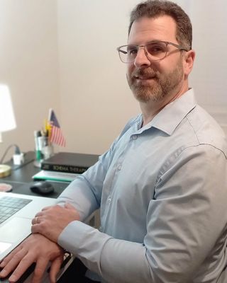Eric J Paesano